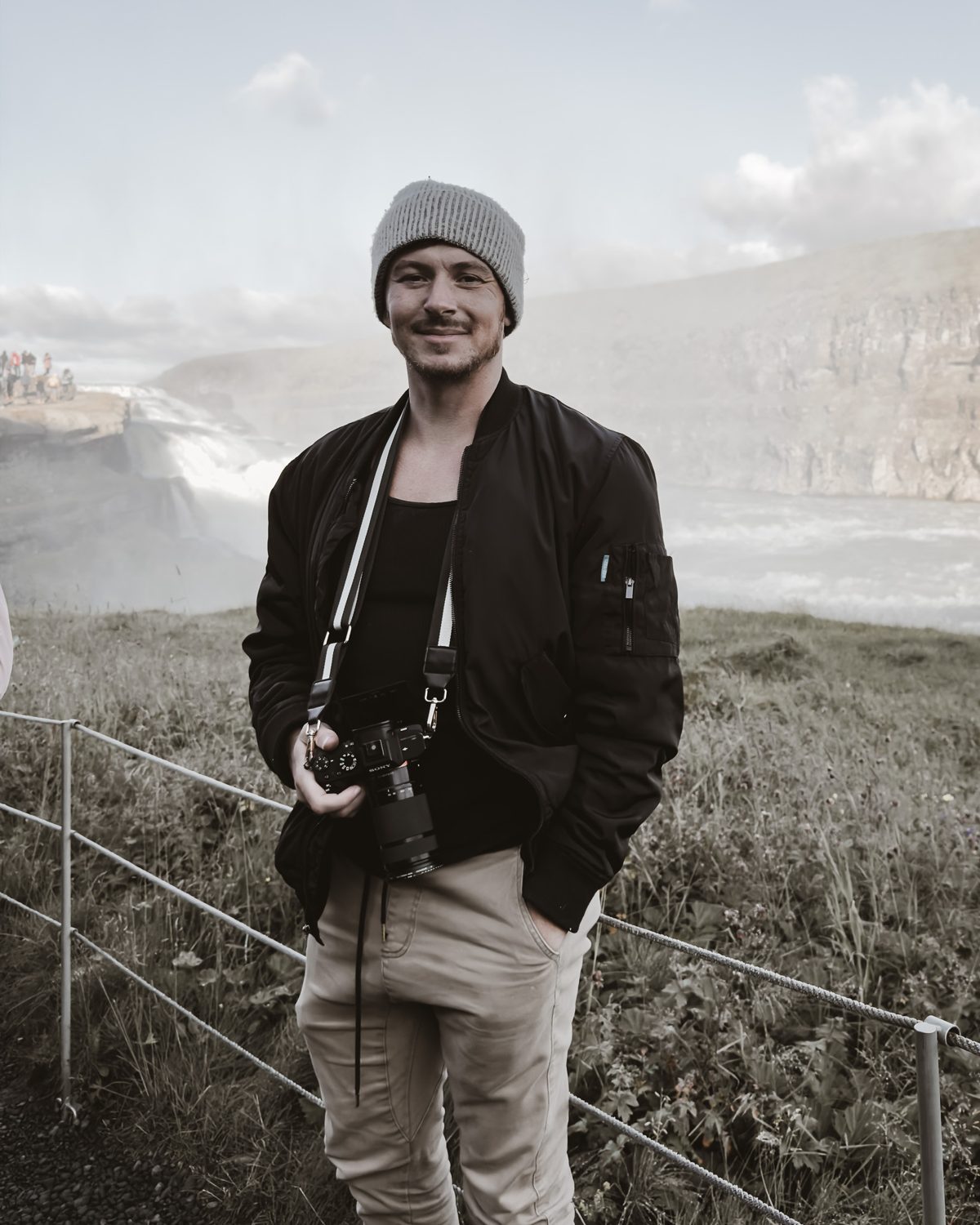 Bobby Finlay holding his camera outdoors